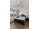 Main bedroom with hardwood floors, decorative ceiling and large windows at 1104 Cooper Point St, Summerville, SC 29485