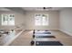 Bright yoga studio with barre and plenty of mats at 1104 Cooper Point St, Summerville, SC 29485