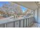 Private balcony overlooking the community parking lot and trees at 1158 Village Creek Lane Unit 4 # 803, Mount Pleasant, SC 29464