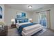 Bright bedroom with a comfy bed and access to a balcony at 1158 Village Creek Lane Unit 4 # 803, Mount Pleasant, SC 29464