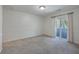 Empty bedroom with carpet flooring and sliding glass doors at 1158 Village Creek Lane Unit 4 # 803, Mount Pleasant, SC 29464
