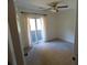 Spacious bedroom featuring carpet, ceiling fan and sliding glass door at 1158 Village Creek Lane Unit 4 # 803, Mount Pleasant, SC 29464