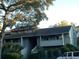 Two-story condo building with grey siding and balconies at 1158 Village Creek Lane Unit 4 # 803, Mount Pleasant, SC 29464