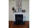 Living room fireplace with artwork and decor at 1158 Village Creek Lane Unit 4 # 803, Mount Pleasant, SC 29464