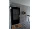 Inviting condo entry with black door and a welcome mat at 1158 Village Creek Lane Unit 4 # 803, Mount Pleasant, SC 29464