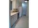 Galley kitchen with white cabinets and new flooring at 1158 Village Creek Lane Unit 4 # 803, Mount Pleasant, SC 29464
