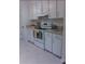 Kitchen with white cabinets and appliances at 1158 Village Creek Lane Unit 4 # 803, Mount Pleasant, SC 29464
