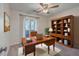 Home office with built-in bookcase and hardwood desk at 1158 Village Creek Lane Unit 4 # 803, Mount Pleasant, SC 29464