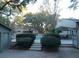Community pool with surrounding landscaping and gazebo at 1158 Village Creek Lane Unit 4 # 803, Mount Pleasant, SC 29464