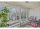 Relaxing sunroom with ample natural light and comfortable seating at 1158 Village Creek Lane Unit 4 # 803, Mount Pleasant, SC 29464