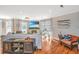 Living room with hardwood floors and large windows at 1436 Battalion Dr, Charleston, SC 29412