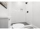 Clean bathroom with white subway tile shower and dark gray hex floor at 1994 Groveland Ave, North Charleston, SC 29405