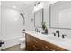 Modern bathroom with double vanity and white tile at 1994 Groveland Ave, North Charleston, SC 29405