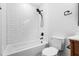 Clean bathroom with white tile and bathtub at 1994 Groveland Ave, North Charleston, SC 29405