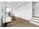 Open living room showcasing a modern aesthetic and kitchen view at 1994 Groveland Ave, North Charleston, SC 29405