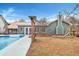Charming backyard with pool, pergola, and playset at 2007 Central Ave, Summerville, SC 29483
