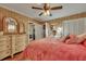 Cozy bedroom featuring a coral comforter and hardwood floors at 2007 Central Ave, Summerville, SC 29483