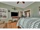 Bedroom with built-in shelves, large bed, and a view of another room at 2007 Central Ave, Summerville, SC 29483