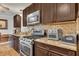 Updated kitchen with granite countertops and stainless steel appliances at 2007 Central Ave, Summerville, SC 29483