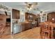 Well-equipped kitchen with dark cabinets and stainless steel appliances at 2007 Central Ave, Summerville, SC 29483