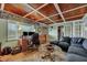 Bright living room with sectional sofa, workspace and coffered ceiling at 2007 Central Ave, Summerville, SC 29483