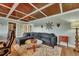 Comfortable living room with sectional sofa, workspace and coffered ceiling at 2007 Central Ave, Summerville, SC 29483