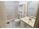 Clean bathroom with shower/tub combo, toilet and vanity at 201 Regent St, Summerville, SC 29483