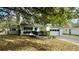 Charming one-story house with a garage and manicured lawn at 201 Regent St, Summerville, SC 29483