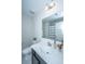 Simple bathroom with single vanity, shower/tub combo and white towels at 264 Godwit Dr, Summerville, SC 29486