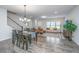 Dining area with a wood table, chairs, and a chandelier at 264 Godwit Dr, Summerville, SC 29486