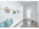 Charming entryway with built-in bench, cubbies, and hat racks at 264 Godwit Dr, Summerville, SC 29486