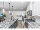 Bright kitchen boasting granite countertops and stainless steel appliances at 264 Godwit Dr, Summerville, SC 29486