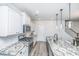Clean kitchen with white cabinets, granite countertops, and stainless steel range at 264 Godwit Dr, Summerville, SC 29486
