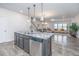 Modern kitchen island with granite countertop and stainless steel dishwasher at 264 Godwit Dr, Summerville, SC 29486