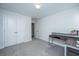 Functional home office featuring L-shaped desk and double door closet at 264 Godwit Dr, Summerville, SC 29486