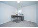 Bright home office with L-shaped desk and ample natural light at 264 Godwit Dr, Summerville, SC 29486