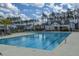 Community lap pool with plenty of lounge chairs at 264 Godwit Dr, Summerville, SC 29486