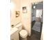 Clean bathroom with a toilet, sink, and bathtub at 2744 E Surrey Dr, North Charleston, SC 29405