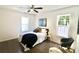 Bright bedroom with queen bed, hardwood floors, and plenty of natural light at 2744 E Surrey Dr, North Charleston, SC 29405