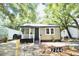 Charming renovated bungalow with a front porch and landscaped yard at 2744 E Surrey Dr, North Charleston, SC 29405