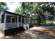 Recently renovated home with a modern gray exterior and white accents at 2744 E Surrey Dr, North Charleston, SC 29405
