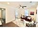 Open living area with hardwood floors, a comfy sofa, and a ceiling fan at 2744 E Surrey Dr, North Charleston, SC 29405