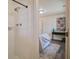 Clean, bright shower with white tiling; bedroom visible from doorway at 303 Longleaf Rd, Summerville, SC 29486