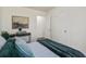 Bright bedroom features stylish decor and a tranquil aesthetic with new bedding at 303 Longleaf Rd, Summerville, SC 29486