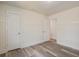 Spacious bedroom showcasing laminate flooring and neutral paint with great natural light at 303 Longleaf Rd, Summerville, SC 29486