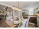 Open-concept dining room featuring a decorative table and easy flow into the kitchen at 303 Longleaf Rd, Summerville, SC 29486