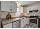 Bright kitchen with granite countertops, stainless steel appliances, and ample storage at 303 Longleaf Rd, Summerville, SC 29486