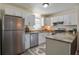 Modern kitchen with stainless steel appliances and granite countertops at 303 Longleaf Rd, Summerville, SC 29486