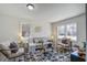 Comfortable living room featuring modern decor, neutral tones and great natural light at 303 Longleaf Rd, Summerville, SC 29486