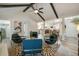 Open living space with kitchen view and unique chairs at 303 Longleaf Rd, Summerville, SC 29486